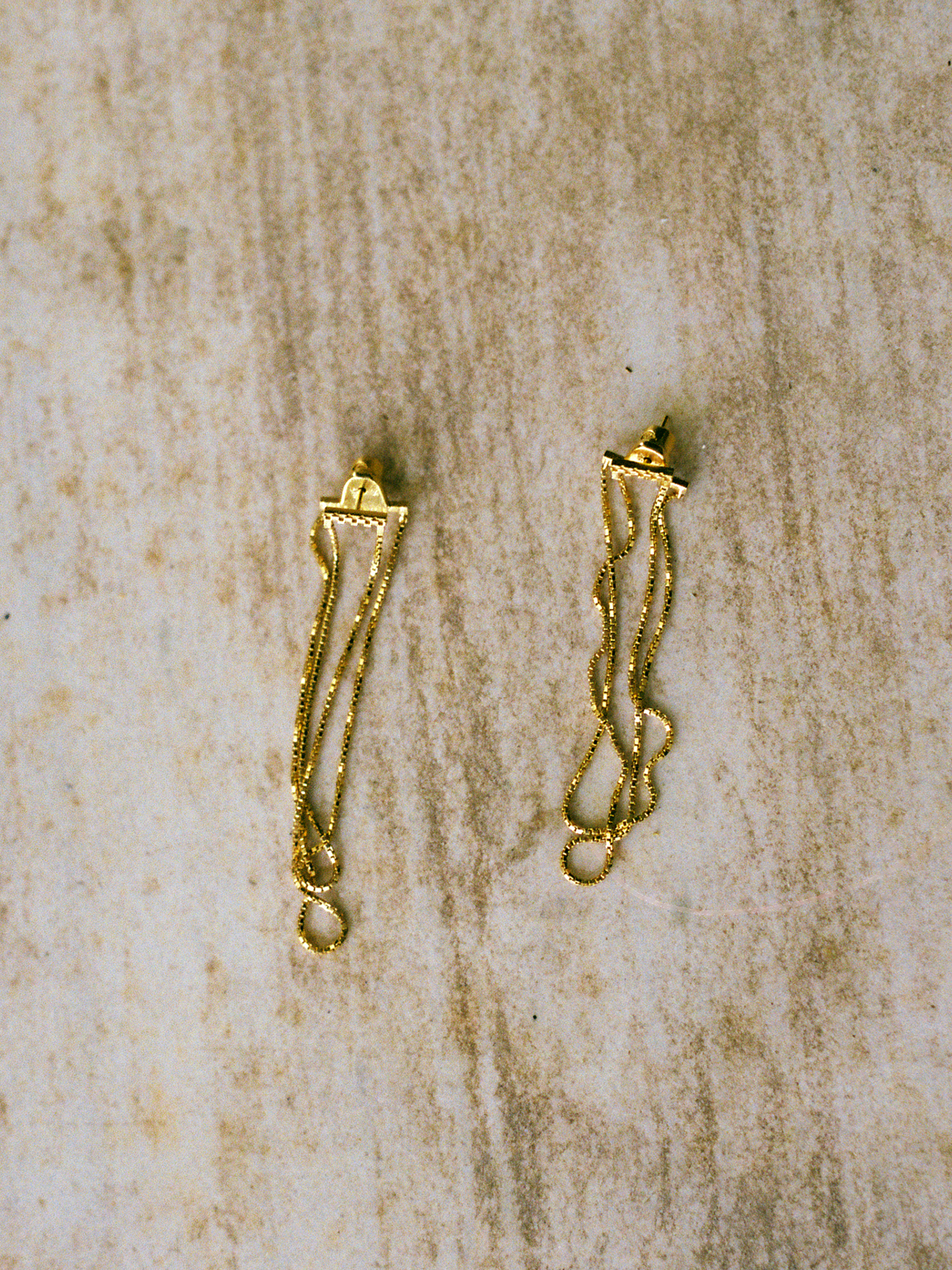 CURRENTS CROSS EARRINGS